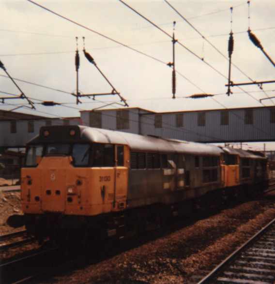 31130 in Old Railfrieght at P'Boro with an unknown 31