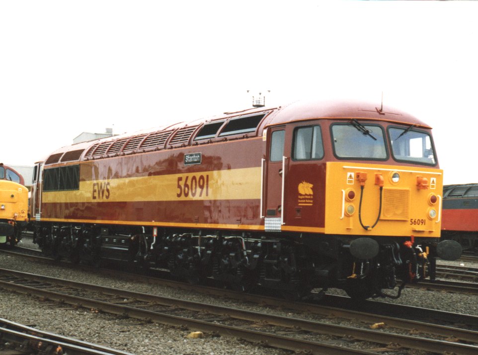 56091 in EWS Livery at Toton.