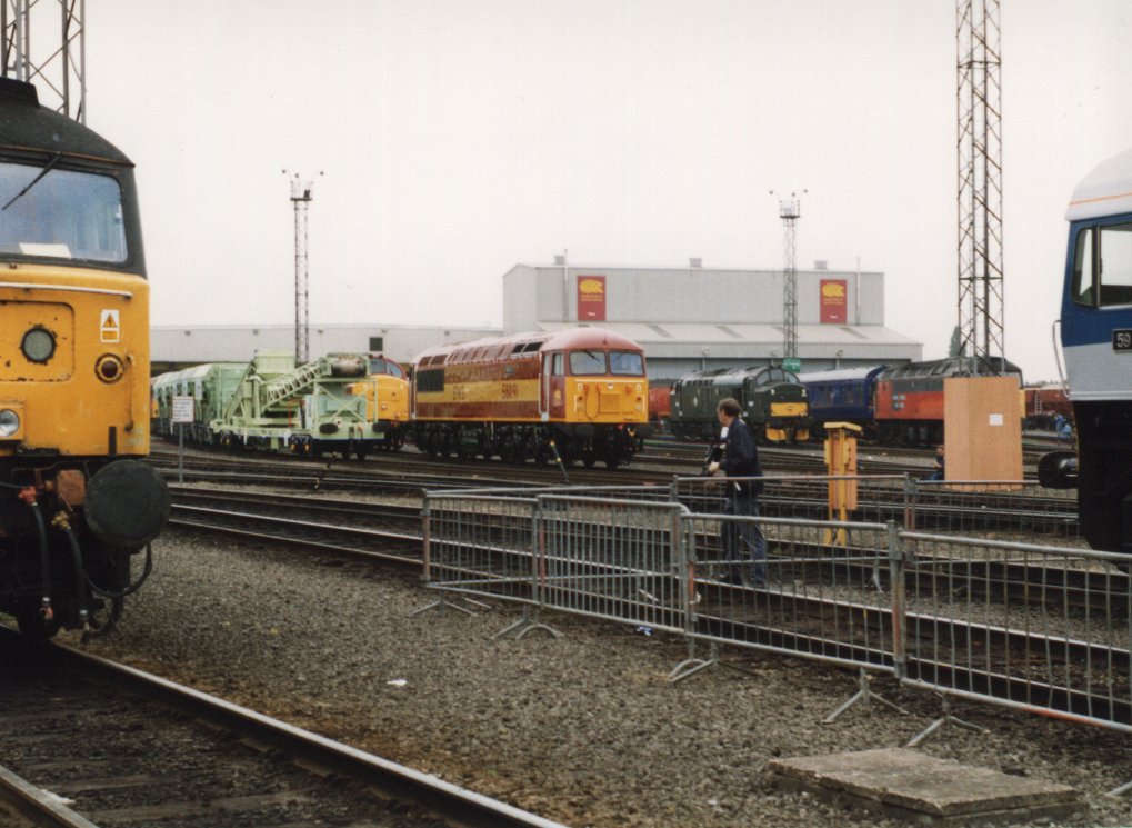 56091 in EWS Livery at Toton.