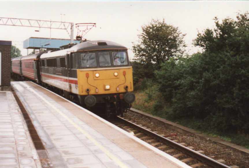 864xx in Swallow Intercity Livery at Norton Bridge.