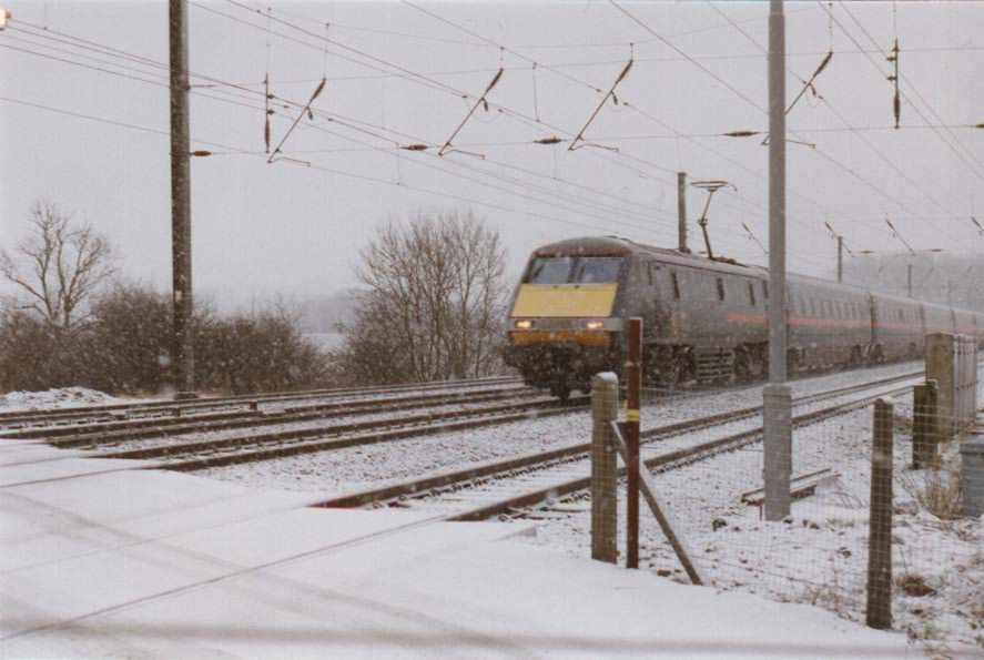 Class 91 in the Snow at Greatford Crossing
