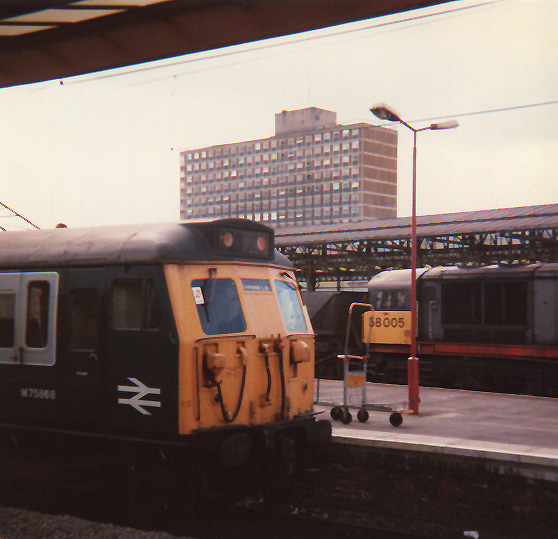 58005 & 305 at Crewe.